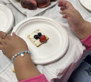 fruit on a cracker on childs plate